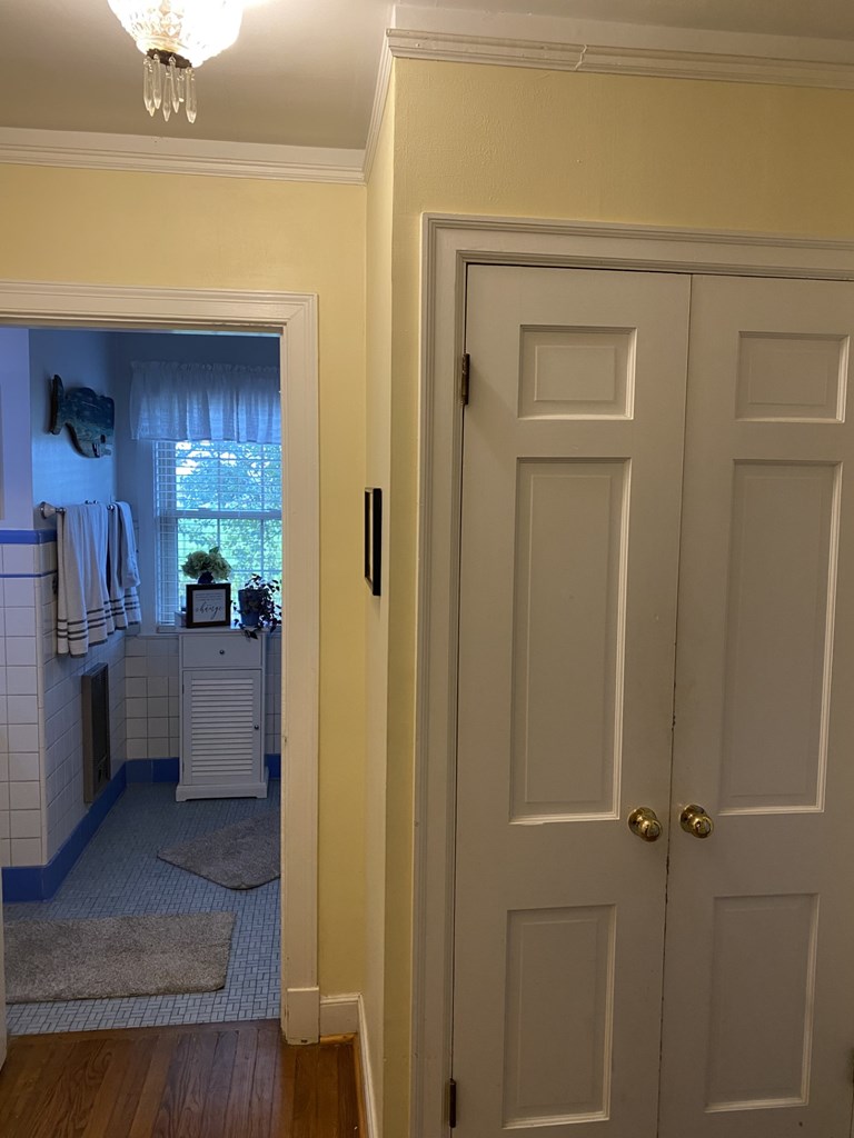Additional view of suite area leading to bathroom